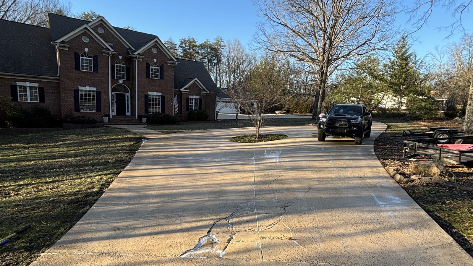Driveway and concrete by Parvin's Pressure Washing